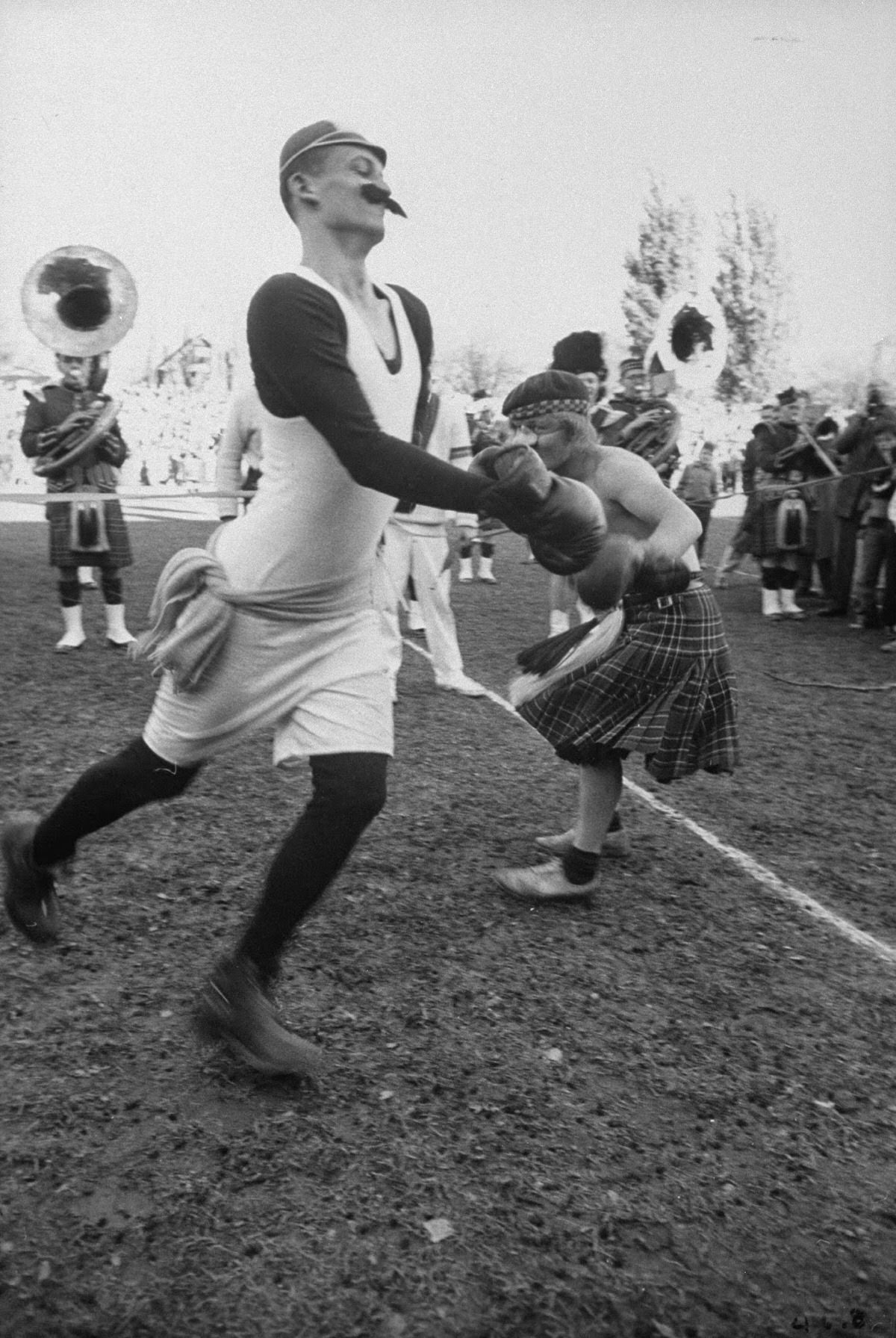 Parody pugilist performs during the Queen's half-time sketches.