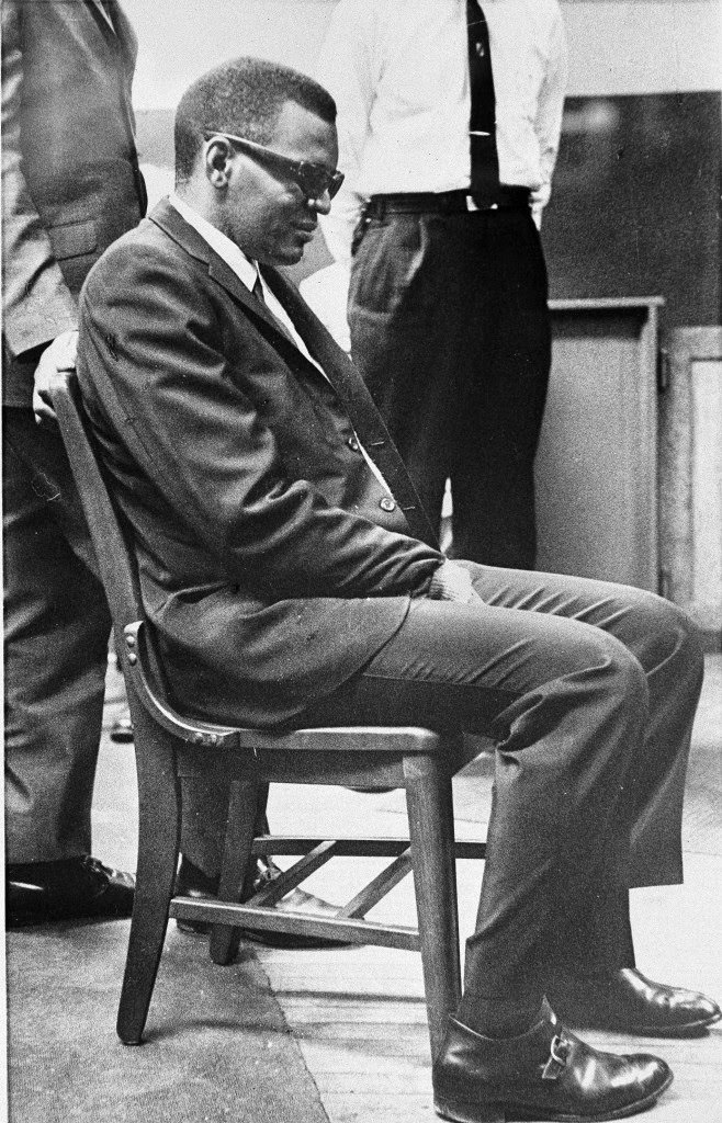 Singer Ray Charles sits in Indianapolis Municipal Court during preliminary hearings on narcotics charges filed against him last November, Jan. 9, 1962.