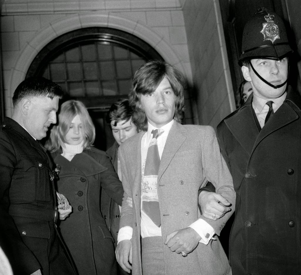 Mick Jagger, lead singer of the Rolling Stones, and his former girl friend Marianne Faithfull after the conclusion of the case at Marlborough Street Court, in which they had pleaded not guilty to possessing cannabis resin. The charge against Marianne was dropped but Jagger was fined £200 with 50 guineas costs.