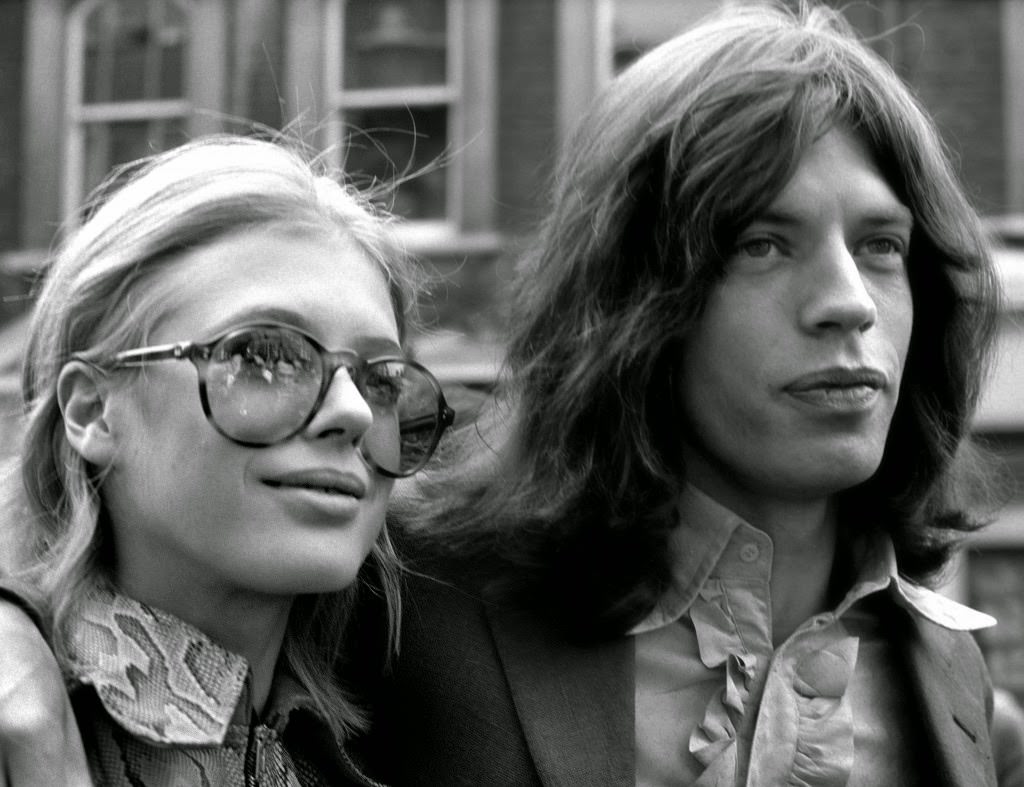 Mick Jagger, lead singer of the Rolling Stones, and actress Marianne Faithfull, on their way to Marlborough Street Court on a charge of possessing cannabis. Date: 29/05/1969.