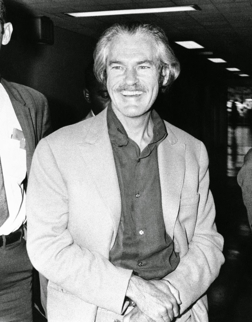 This is a 1970 photo of Dr. Timothy Leary, in custody of federal marshals as he leaves the Federal Building in Houston, Jan. 16, 1973 after being sentenced to 10 years in prison on marijuana charges.