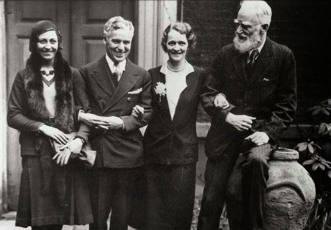 Nancy Astor (Lady Astor), the first woman to serve as a Member of Parliament in the British House of Commons; Charlie Chaplin; Britain's greatest airwoman, Amy Johnson; and playwright George Bernard Shaw at Lady Astor's home, 1931.