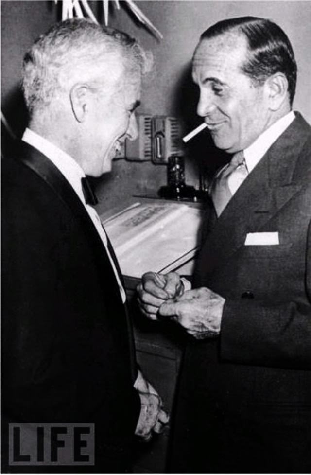 Charlie Chaplin meets the legendary Al Jolson at the El Morocco nightclub in New York, 1947.