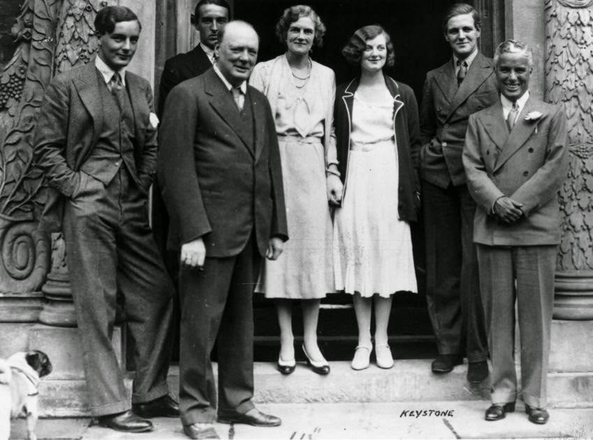 Winston Churchill with his family and Chaplin at the Churchill home in Kent, 1931.