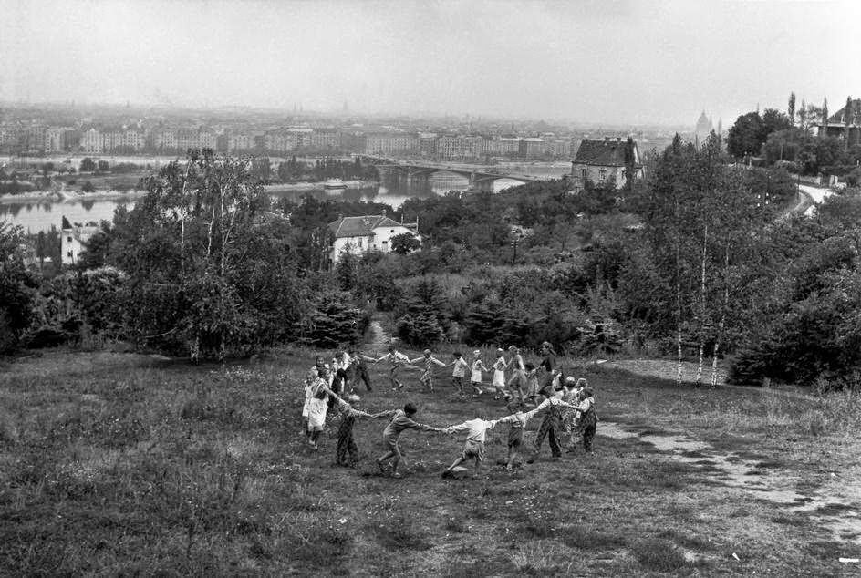 Children playing in a suburban park near the Danube and Margareten Bridge in Budapest, 1948