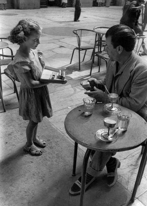 Girl selling black market cigarettes at cafes in Naples, 1948
