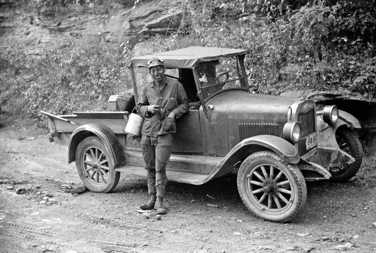 Coal miner waiting to go home in friend's truck