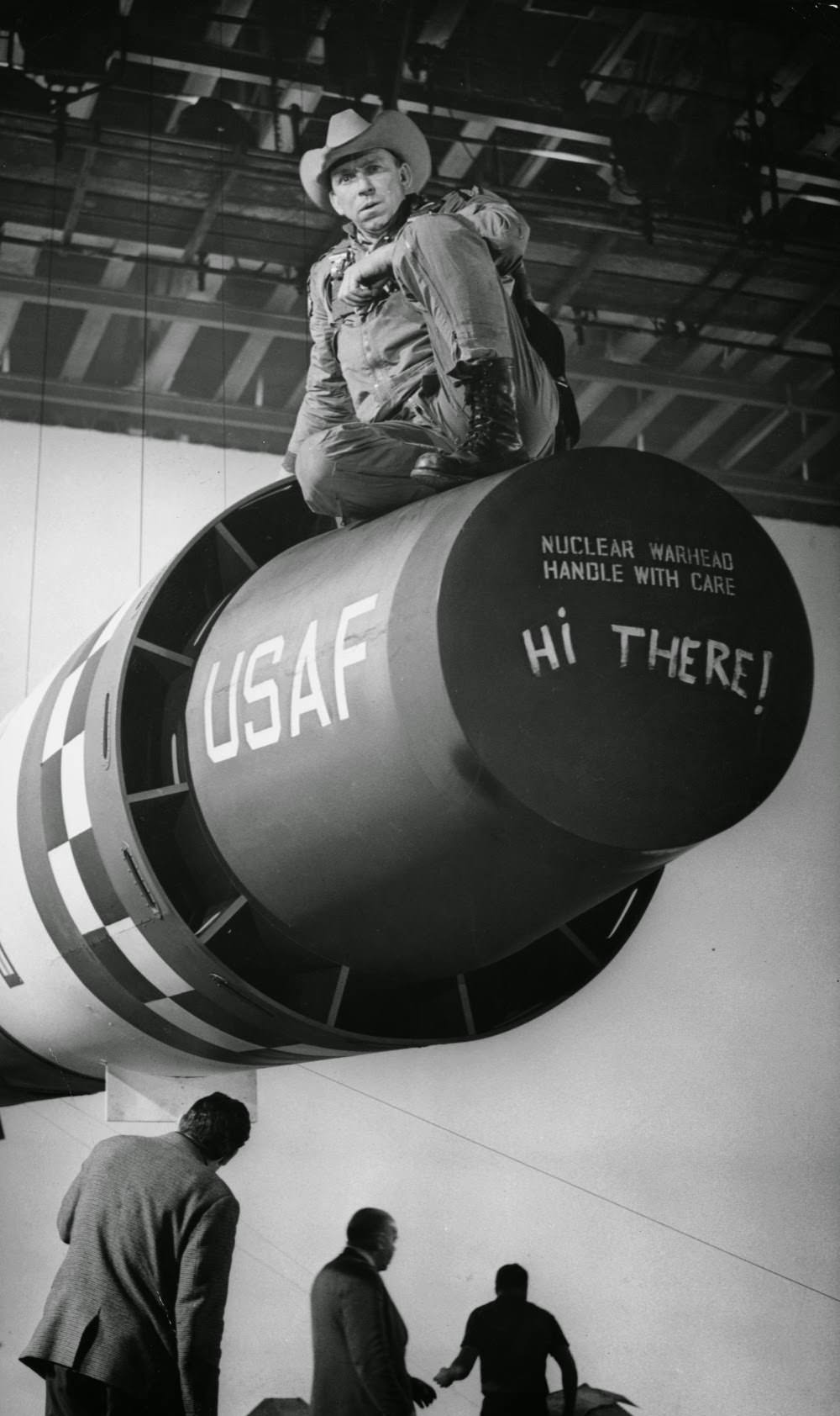 Actor Slim Pickens gets into position on the atomic bomb. Clutching his cowboy hat, Major T. J. ‘King’ Kong (Pickens) will ride the bomb as it is dropped onto its Soviet target – truly a horseman of the apocalypse.