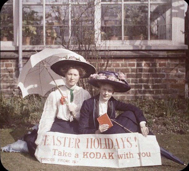 Women with a Happy Easter and Buy Kodak sign, 1917