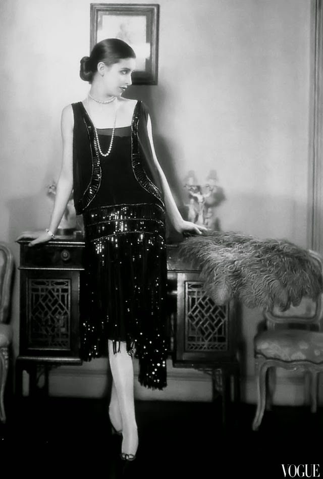Model and photographer, Marion Morehouse is wearing black sequined dress by Chanel, Vogue 1926