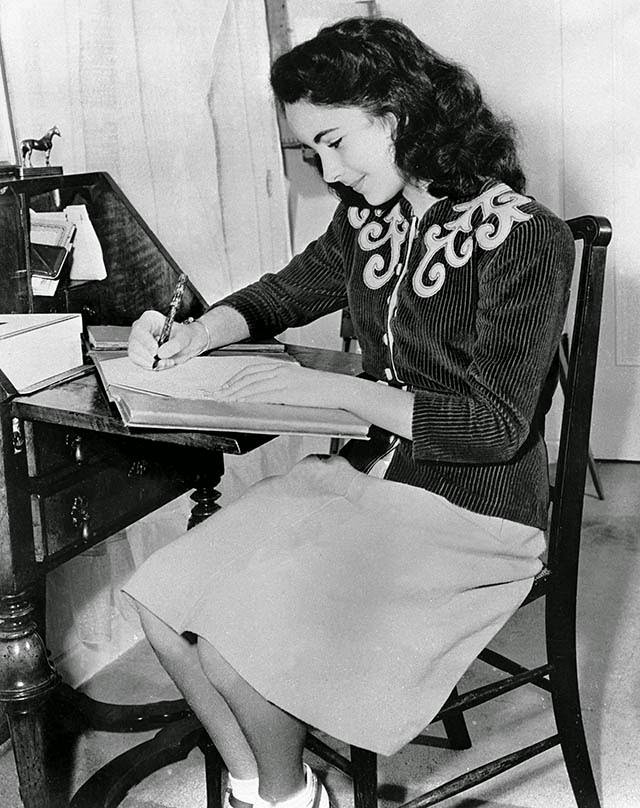 Taylor at her desk, 1945.