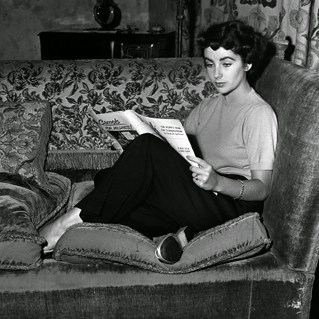 Reading Look magazine, 1948.