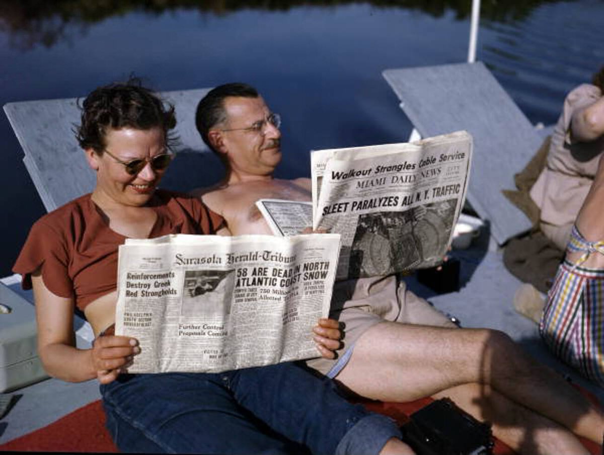 Mabel and Archie aboard their shantyboat Lazy Bones on the Caloosahatchee River, 1940s