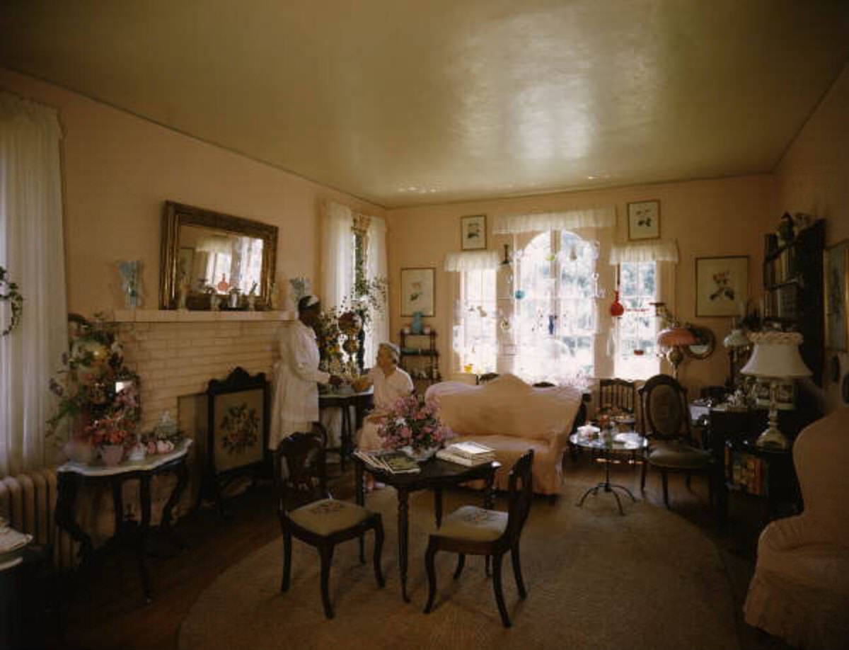 African American women serving tea in a parlor in Pass Christian, Mississippi, 1940s