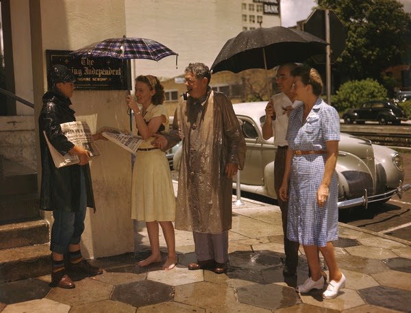 Handing out copies of The Evening Independent in St. Petersburg, Florida, 1947
