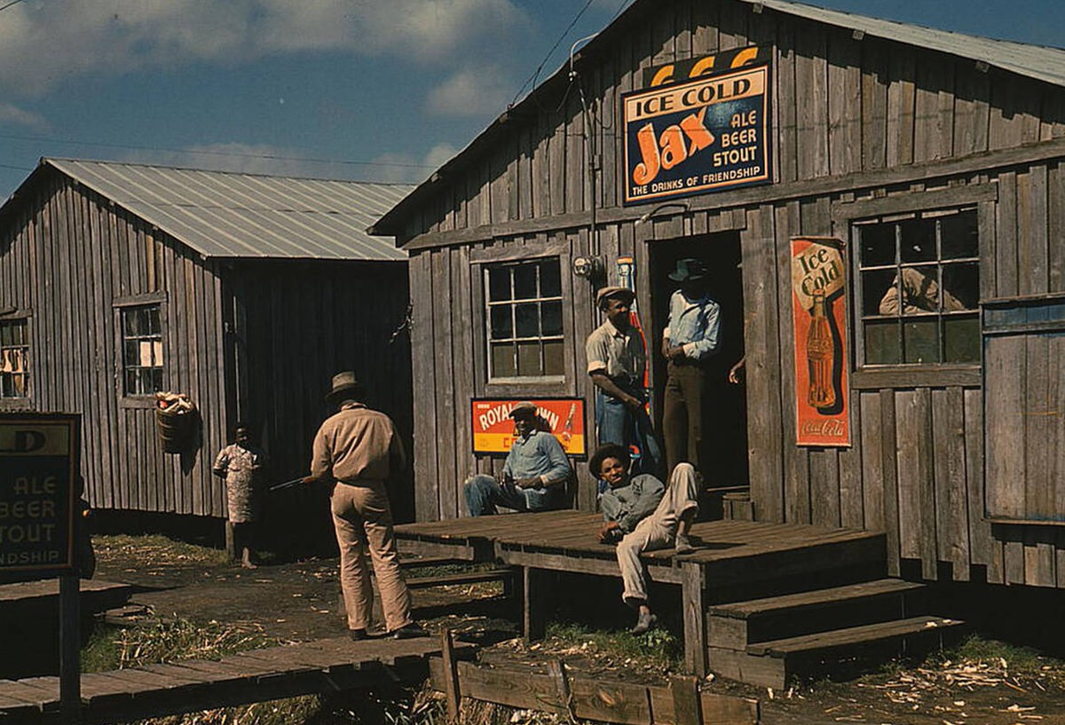 Living quarters and a juke joint for migratory workers in Belle Glade, Florida, 1940s