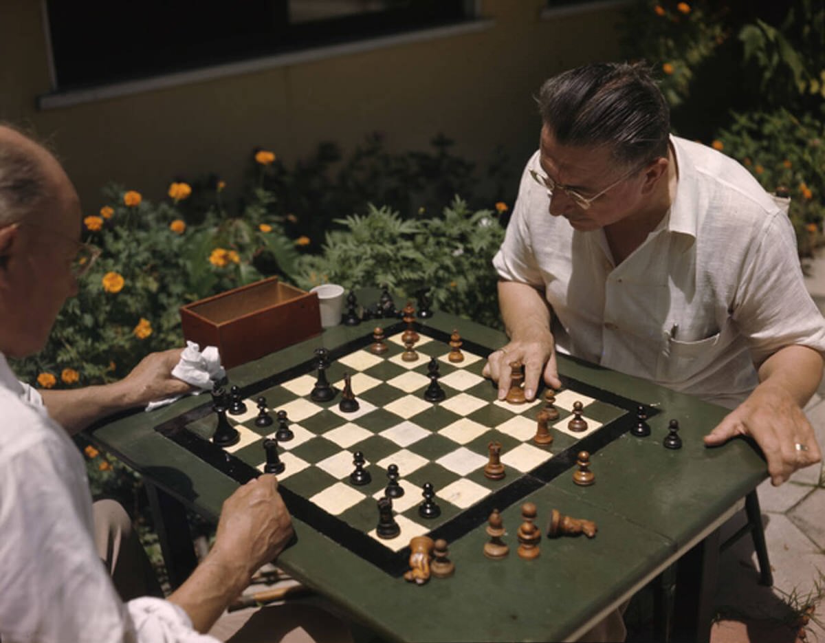 Men playing chess outdoors in St. Petersburg, Florida, 1940s