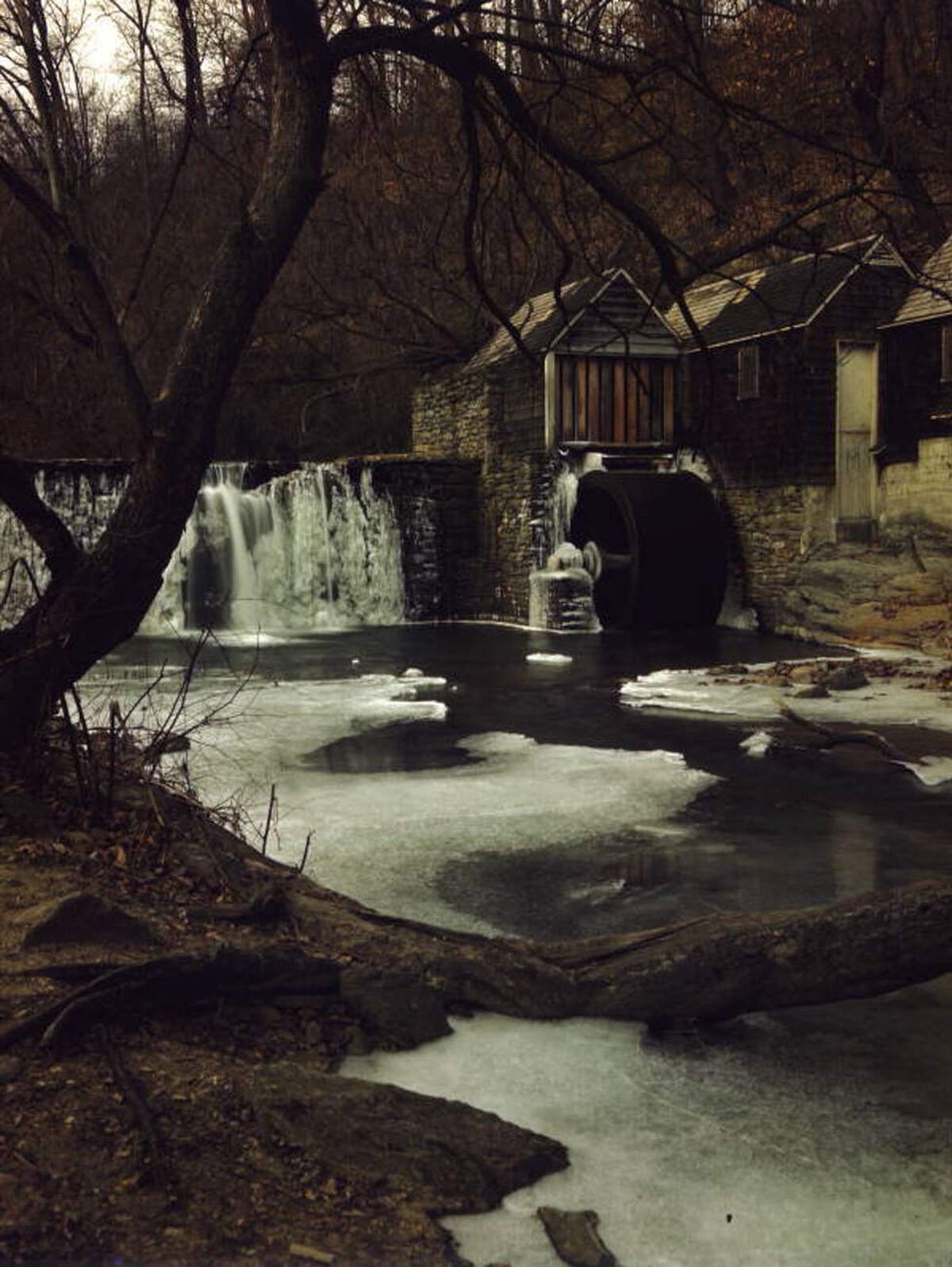 Old water mill near Philadelphia, Pennsylvania, during winter, 1940s