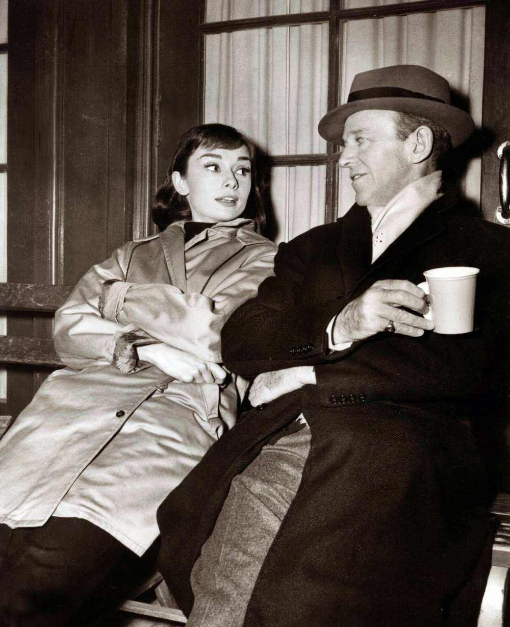 Hepburn and Astaire chat over coffee