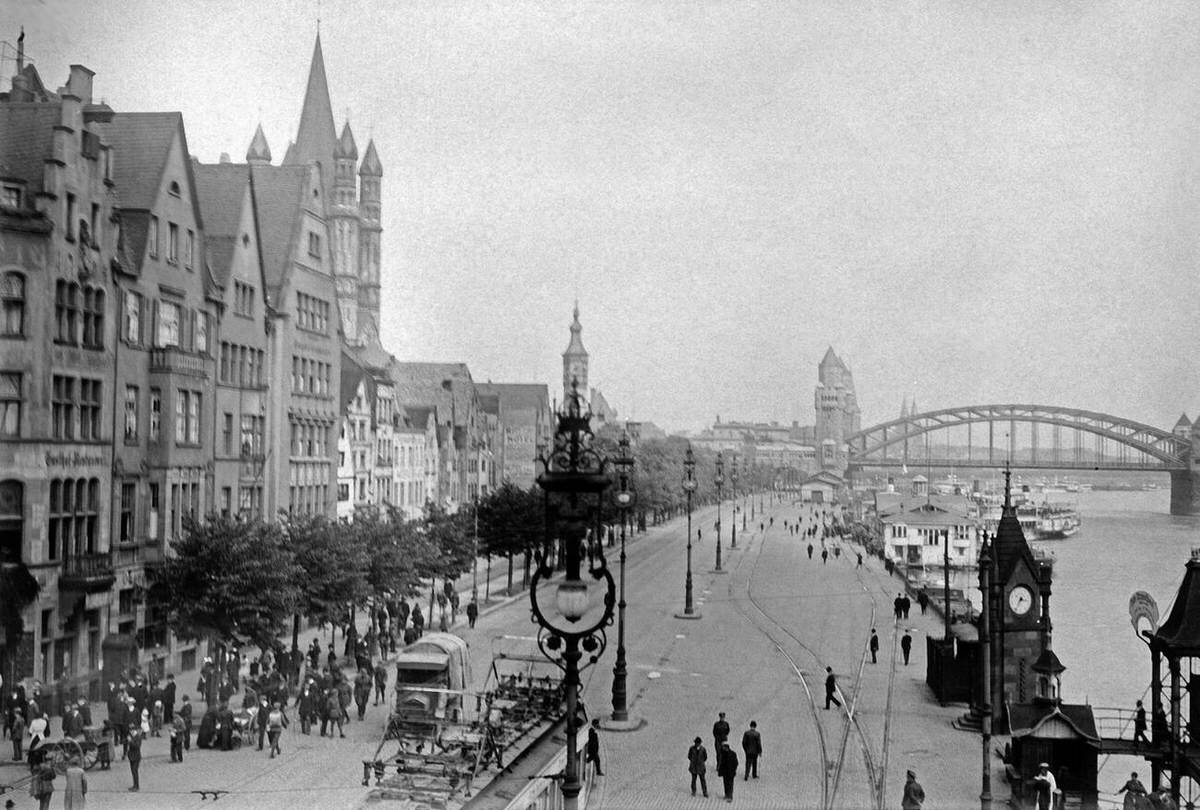 Passersby at the old city shore of the River Rhine in Cologne, Germany, 1913