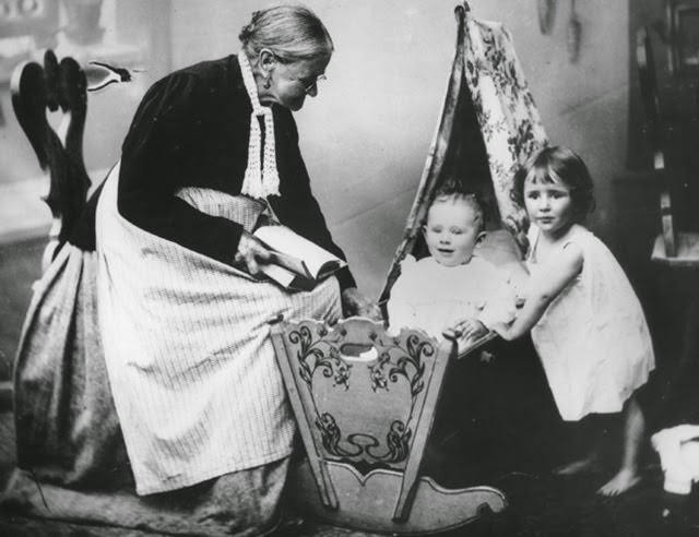 In the care of grandmother, c. 1910. Industrialization caused a demographic shift in Imperial Germany. Seeking industrial employment, former agricultural workers moved to cities, where they lived in cramped, overcrowded apartments. Often, both parents needed to work to pay for rent and daily necessities. In the photo below, an elderly working-class woman looks after her grandchildren. When both parents had to work, grandparents made essential contributions to the household, especially with respect to child care.