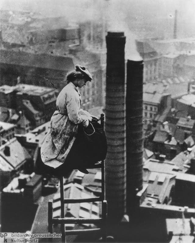 A female mason perched high above Berlin, c. 1910. With the rise of industrialization, the number of German women who worked outside the home also increased. This usually meant factory work. But in some families with their own businesses, daughters also learned a trade so that they could help out: here, we see a master-mason's daughter during the renovation work on the old city hall tower in Berlin.