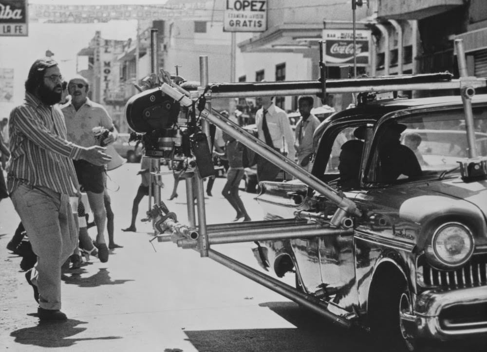 Francis Ford Coppola in production on a 1950s street scene, The Godfather Part II, 1974