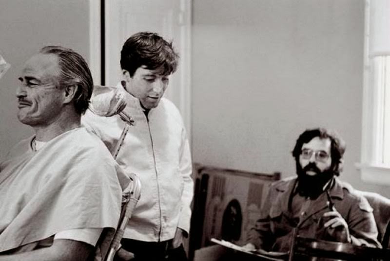 Marlon Brando, Al Pacino, and Francis Ford Coppola during a makeup session, The Godfather, 1972