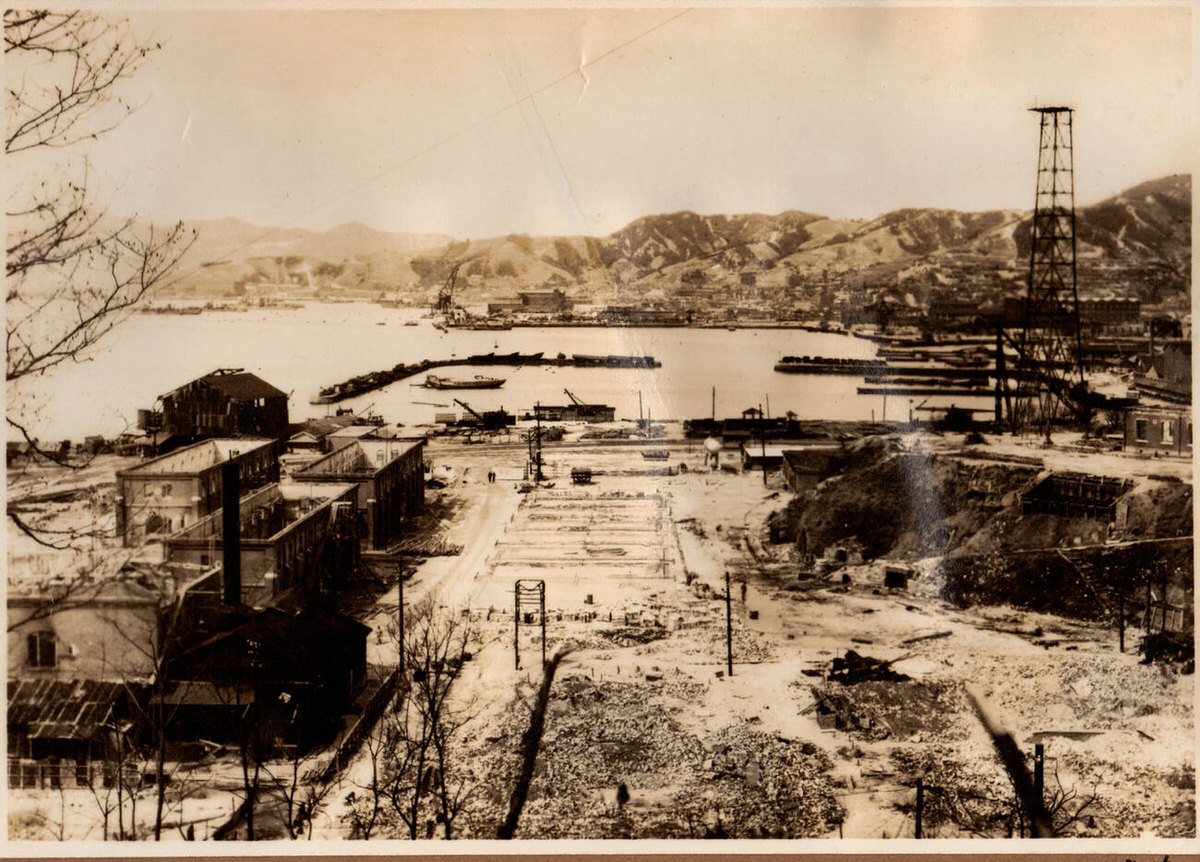 Aftermath of conventional and atomic bombing at the Kure dockyard in Hiroshima, 1945