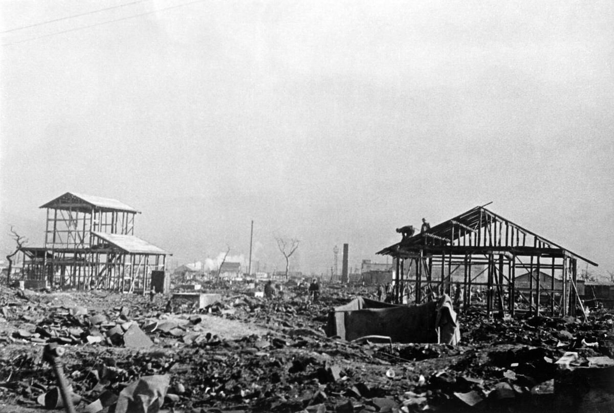 New wooden houses under construction in the ruins of Hiroshima, 1945