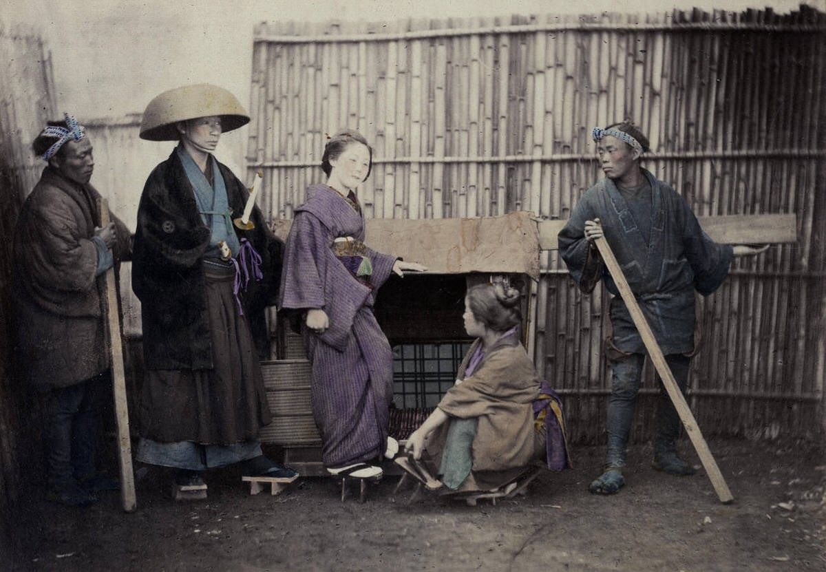 Young woman in a kago with bearers, 1860s