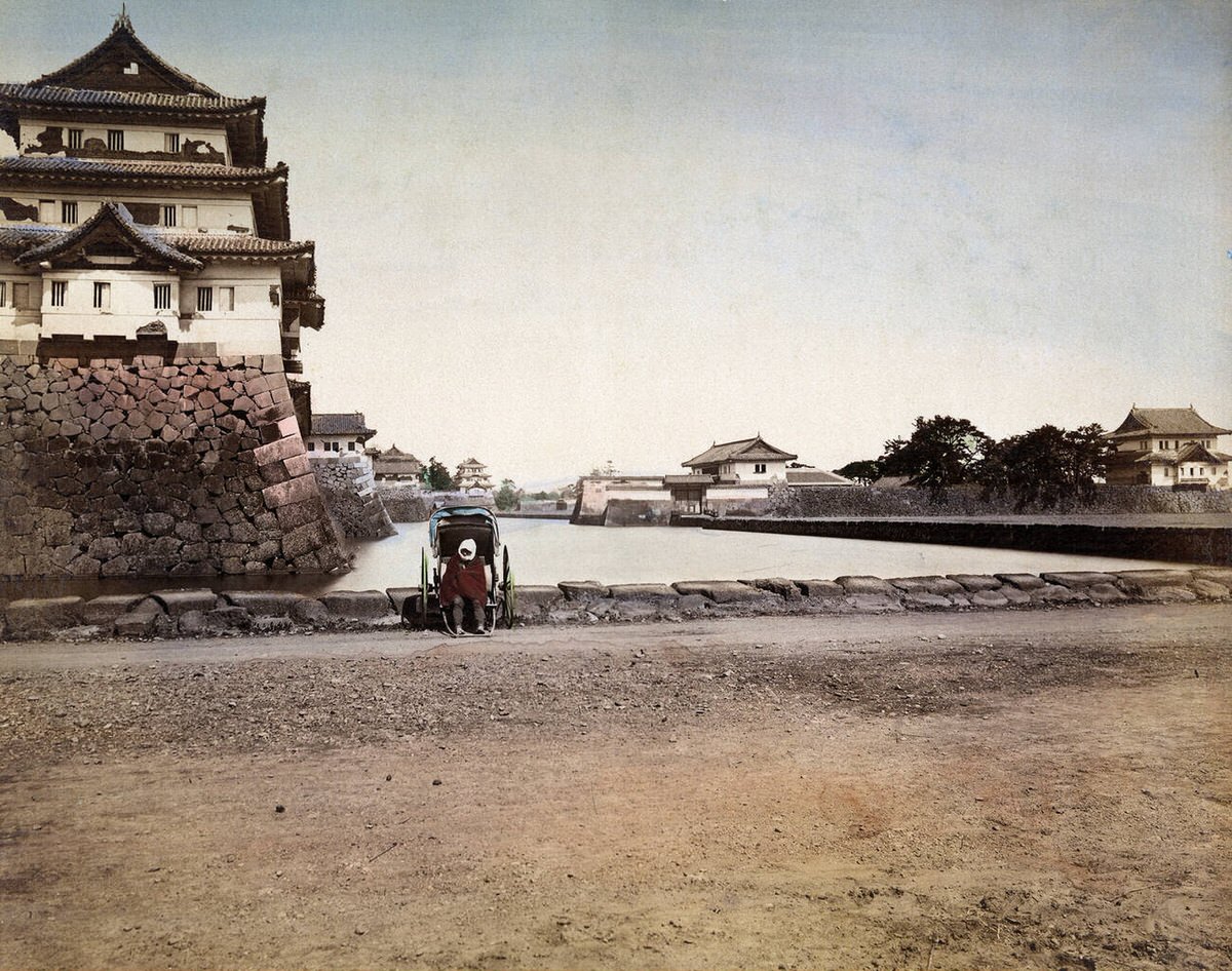 Rickshaw puller at the Hasuike Tatsumi Sanju Yagura at the Imperial Palace in Tokyo, 1869