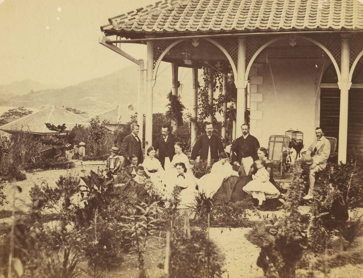 Group portrait at the house of Thomas Glover, 1862