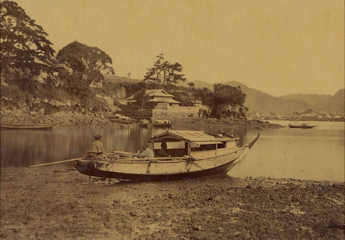 Landscape river scene with three men in a boat in Nagasaki, 1864
