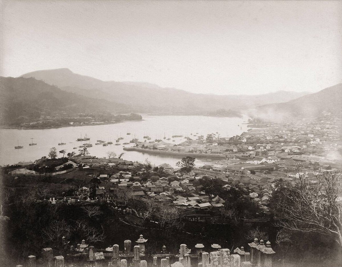 View of the Oura foreign settlement, Dejima, and Nagasaki harbor from Juzenji temple, 1870