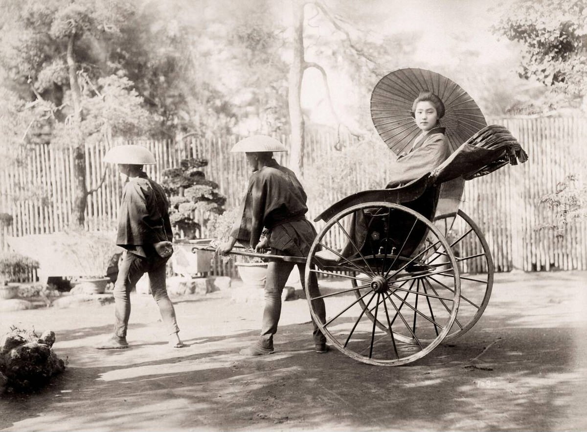 Young woman in a rickshaw, 1890s
