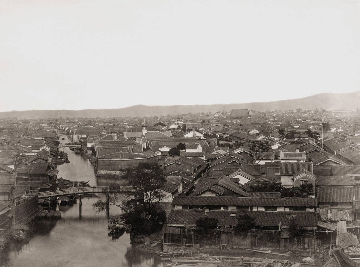 View of Osaka looking east from the Osaka Prefectural Office on Enokojima, 1870