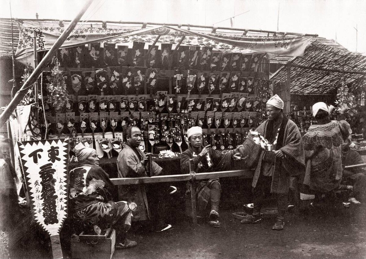 Seller of badminton rackets and shuttlecocks, 1870s