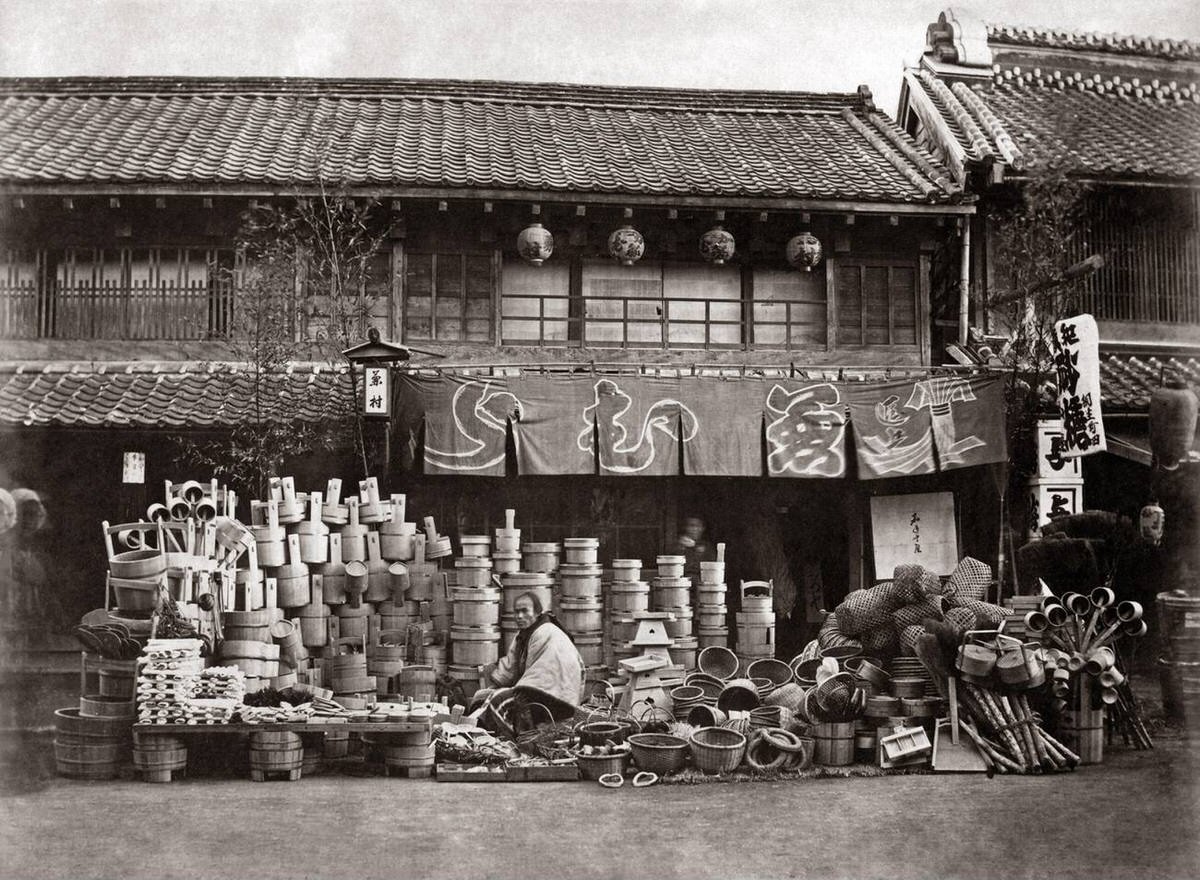 Vendor of pots and brooms in Japan, 1870s
