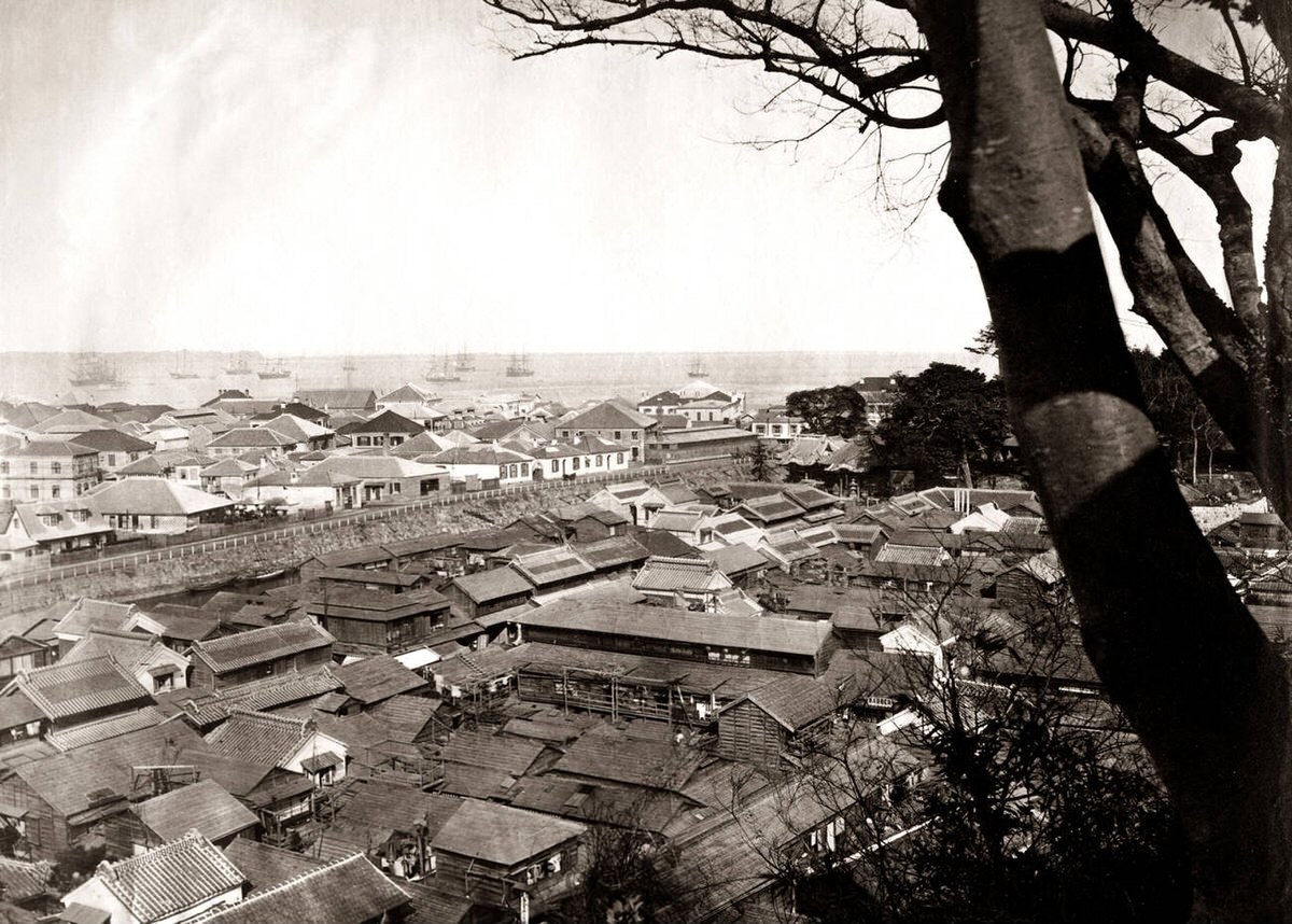 View of Yokohama looking over the city and harbor, 1885