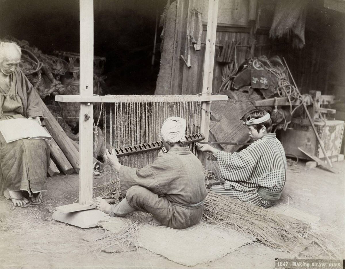 Japanese men weaving straw mats on a loom, 1880