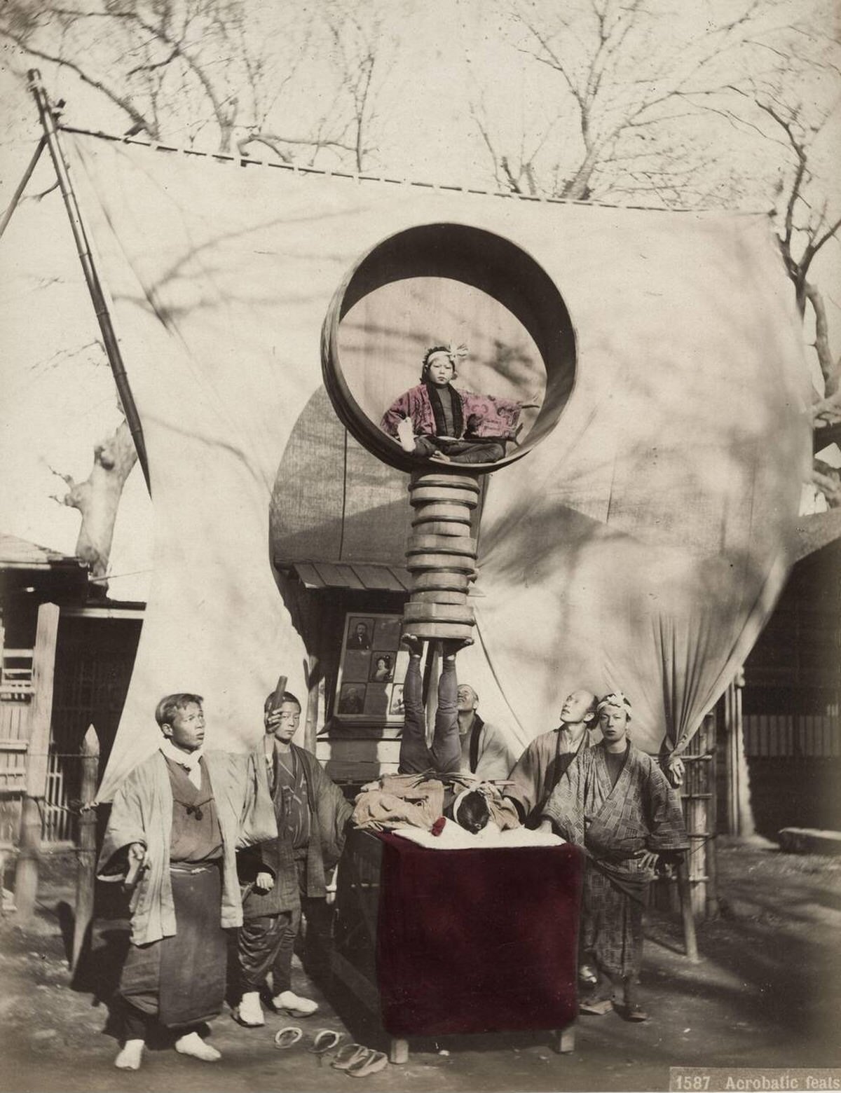 Group of acrobats performing in Japan, 1880s