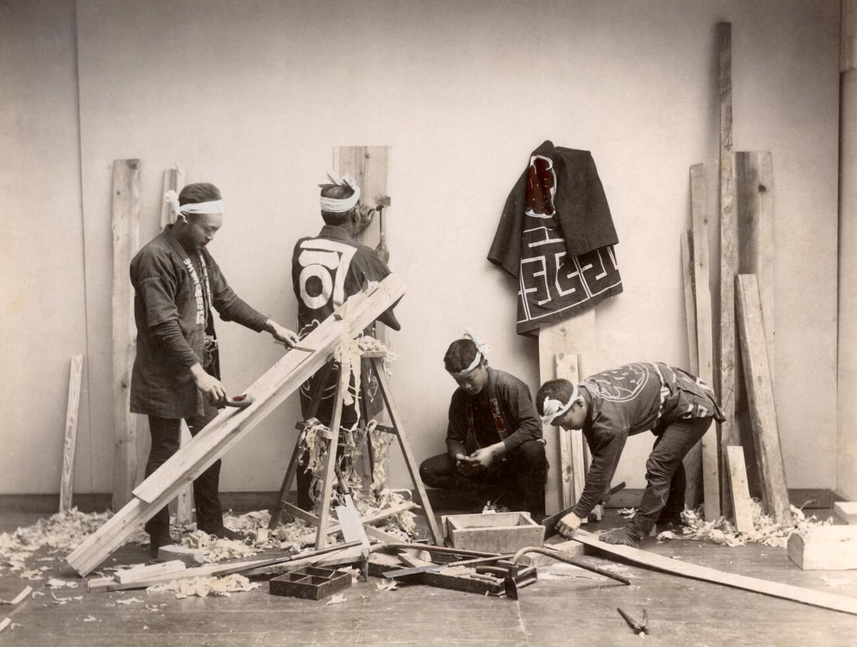 Carpenters planing wood, 1880s