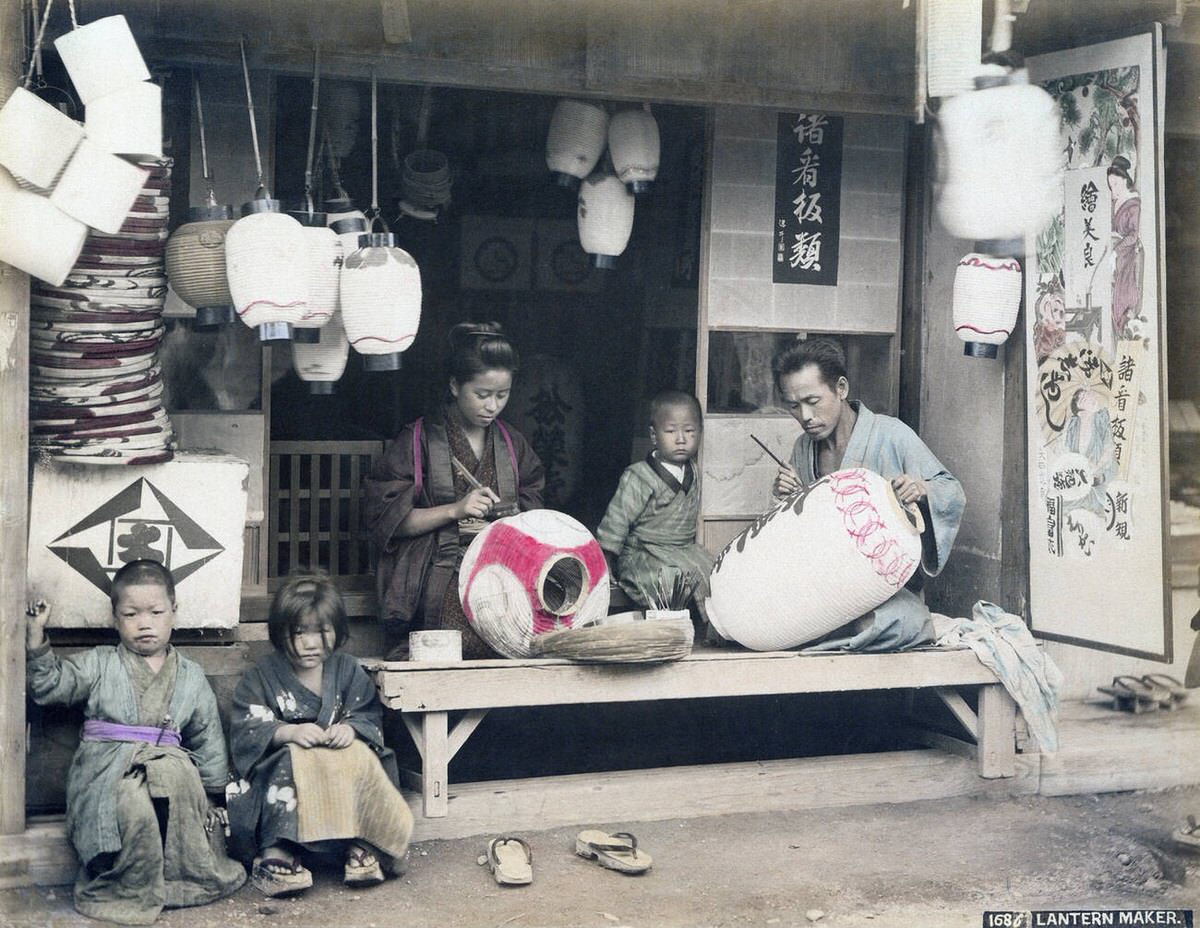 Lantern makers decorating lanterns with calligraphy, 1890s