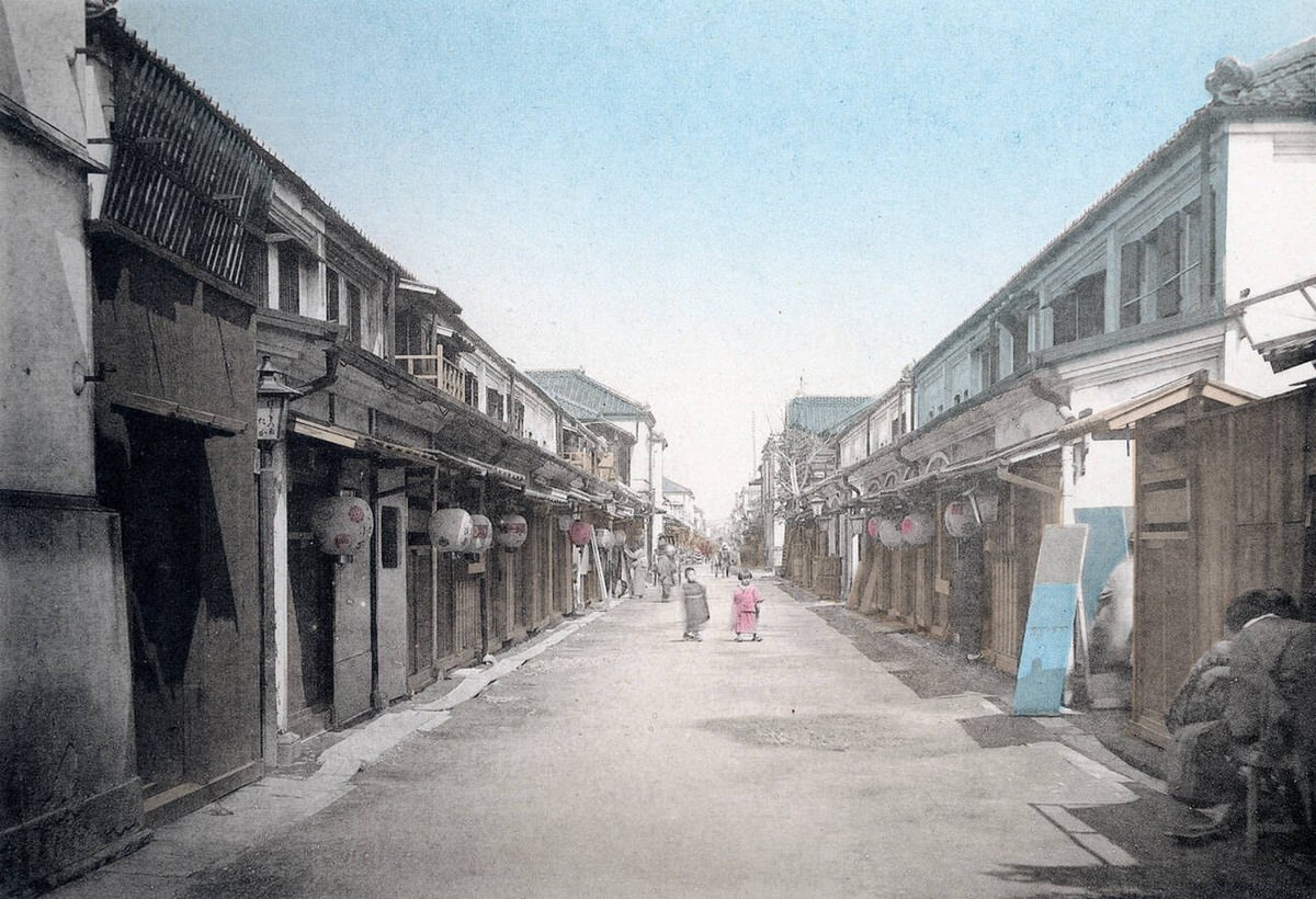 Geisha houses lining a street in Shinbashi, Tokyo, 1890s