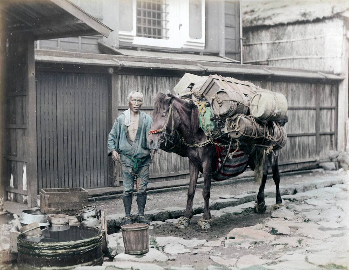 Pack horse driver and his horse wearing straw shoes, 1890