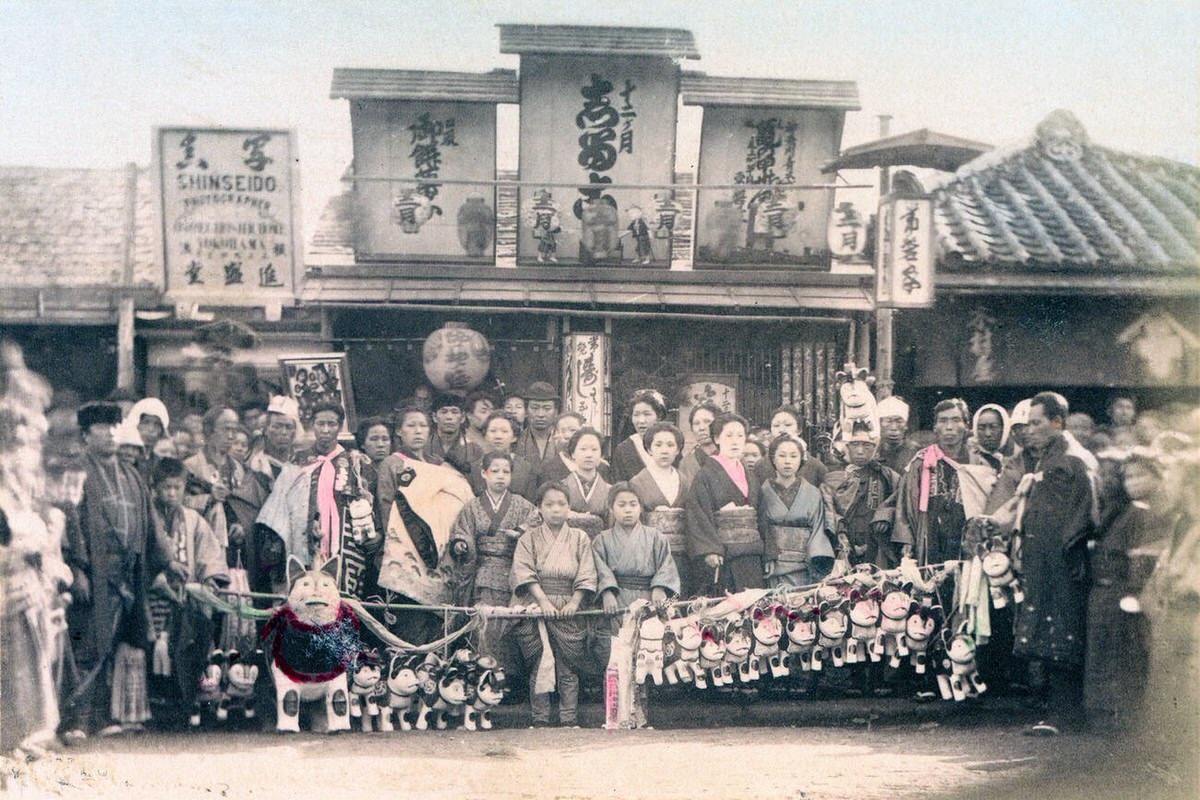 Group celebrating a miyamairi ceremony for a newborn child, 1890s