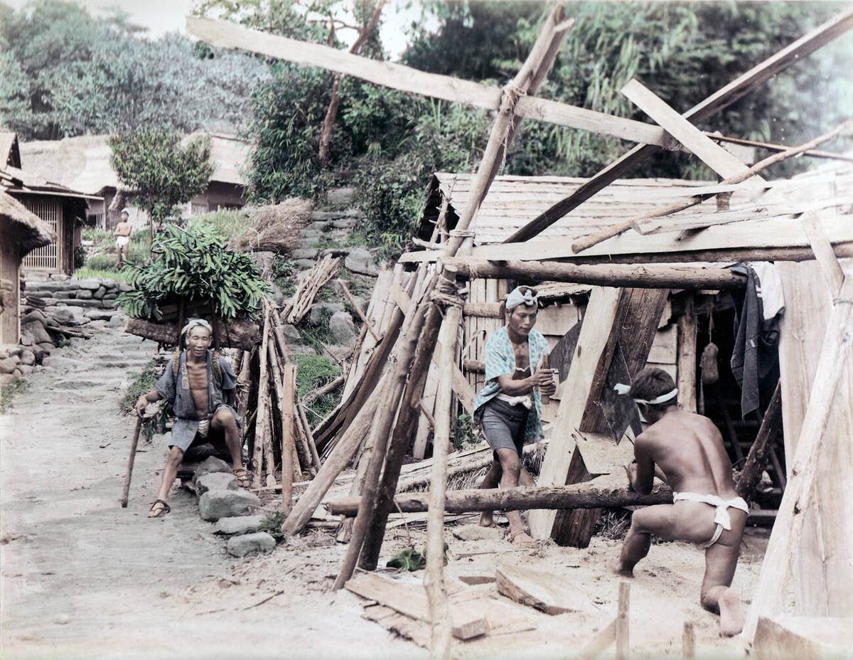 Carpenters at work in a village, 1890