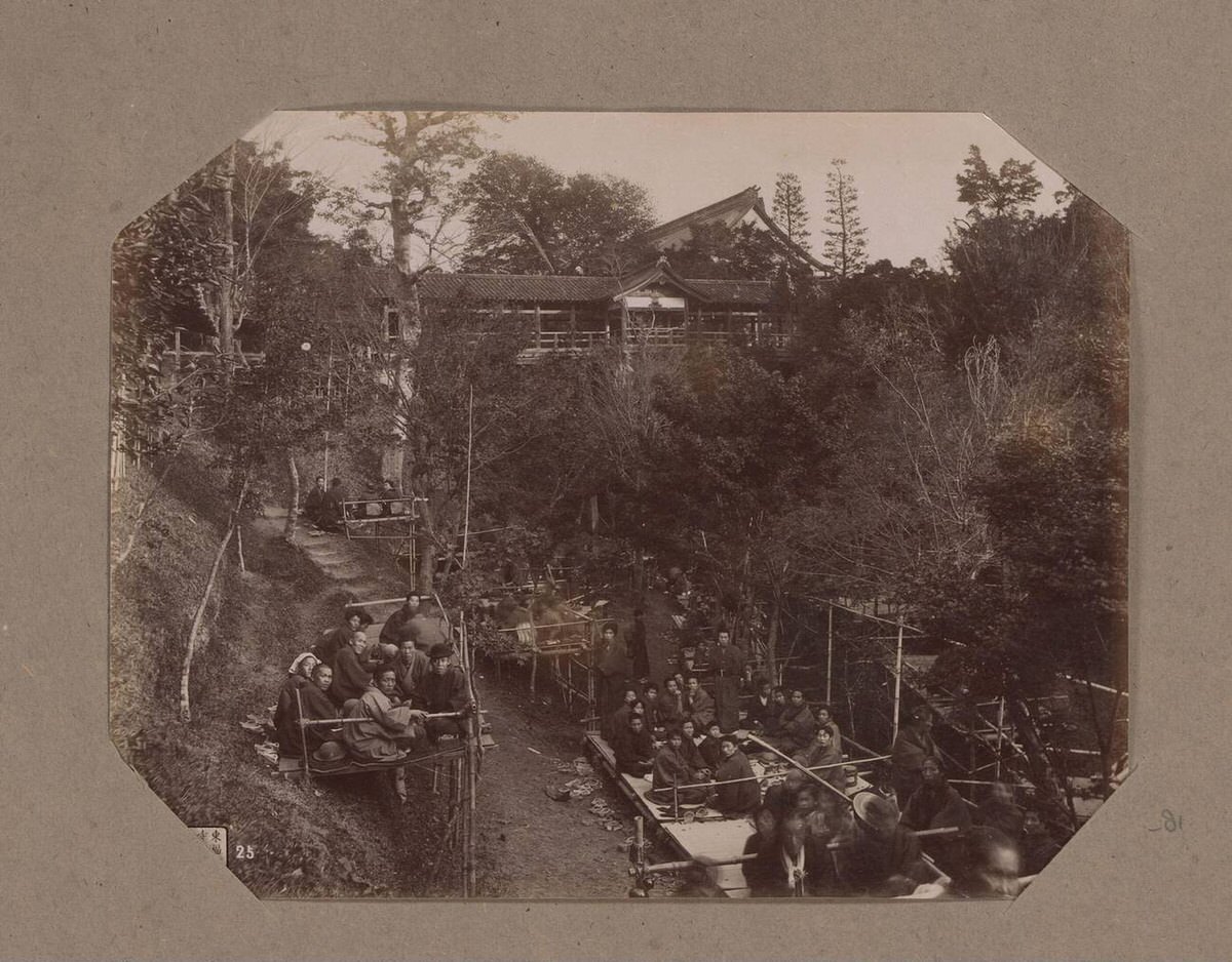 Tsuten-kyo Bridge with people on plateaus in Kyoto, 1890