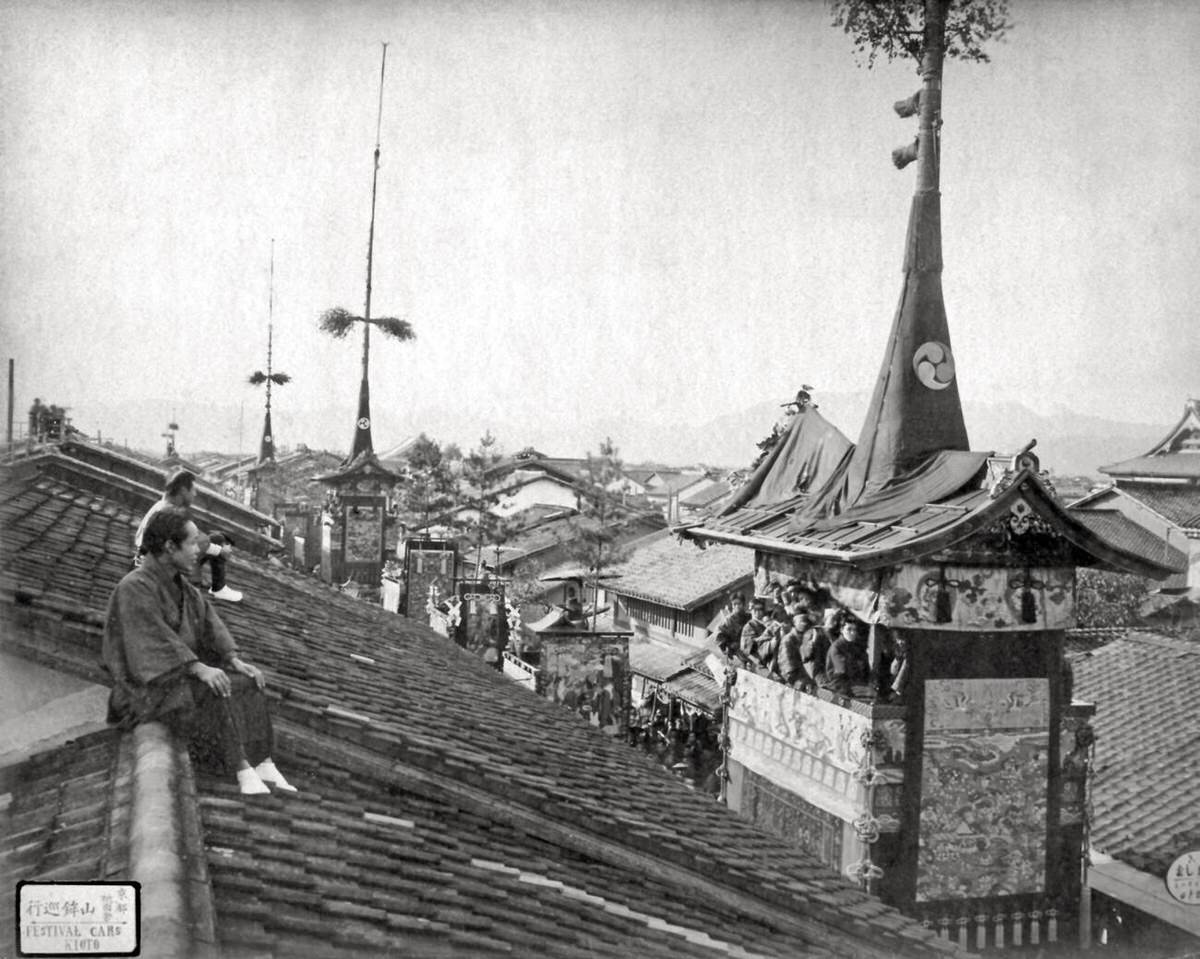 Festival procession seen from a rooftop in Kyoto, 1890